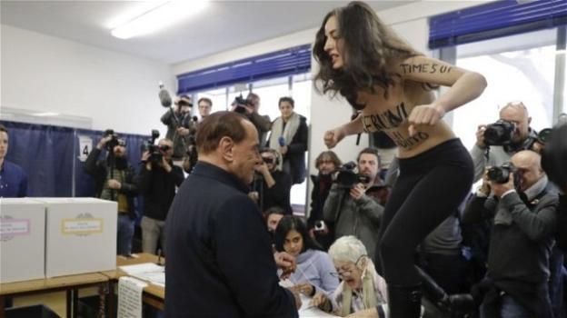 Elezioni 2018, Berlusconi contestato da una donna in topless: “sei scaduto!”