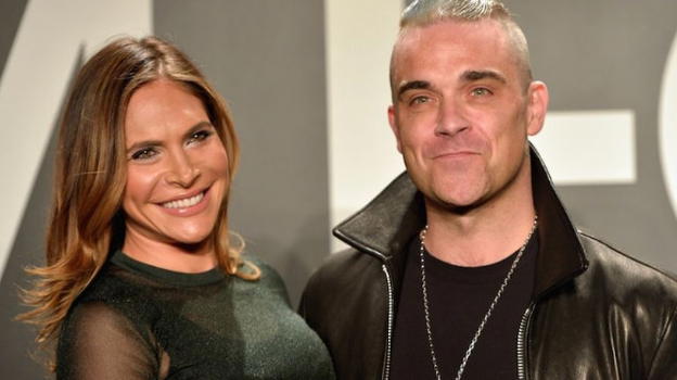 Robbie Williams pensa a un reality con la moglie e la suocera
