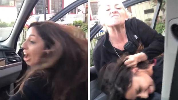 Poliziotta trascina per i capelli una ragazza: il duro arresto scatena le polemiche sui social