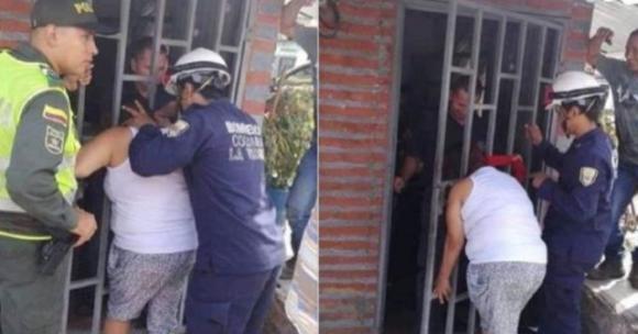 Pettegola spia i vicini che litigano ma resta incastrata nell’inferriata