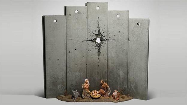 Banksy: nel presepe di Betlemme la stella cometa è il buco lasciato da una granata