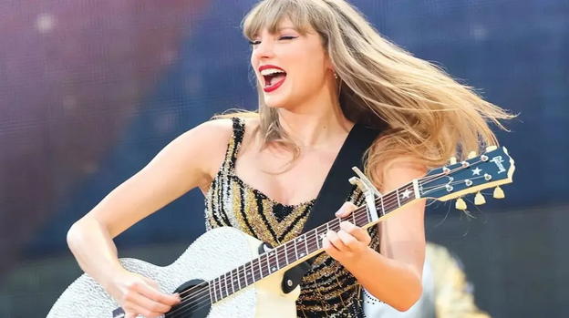 Spende 4 mila dollari per la chitarra autografata di Taylor Swift ma, poi, la rompe