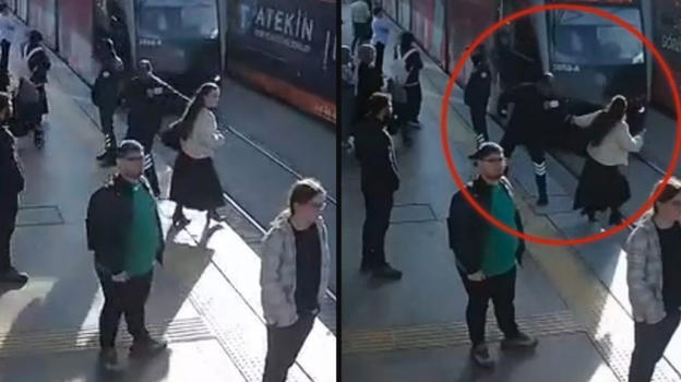 Indossa gli auricolari e un tram rischia di investirla: la guardia la salva