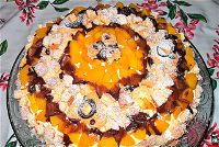 Torta mimosa con pesche e cioccolato