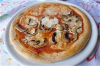 Pizza integrale con funghi