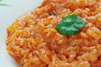 Risotto al pomodoro e scamorza filante