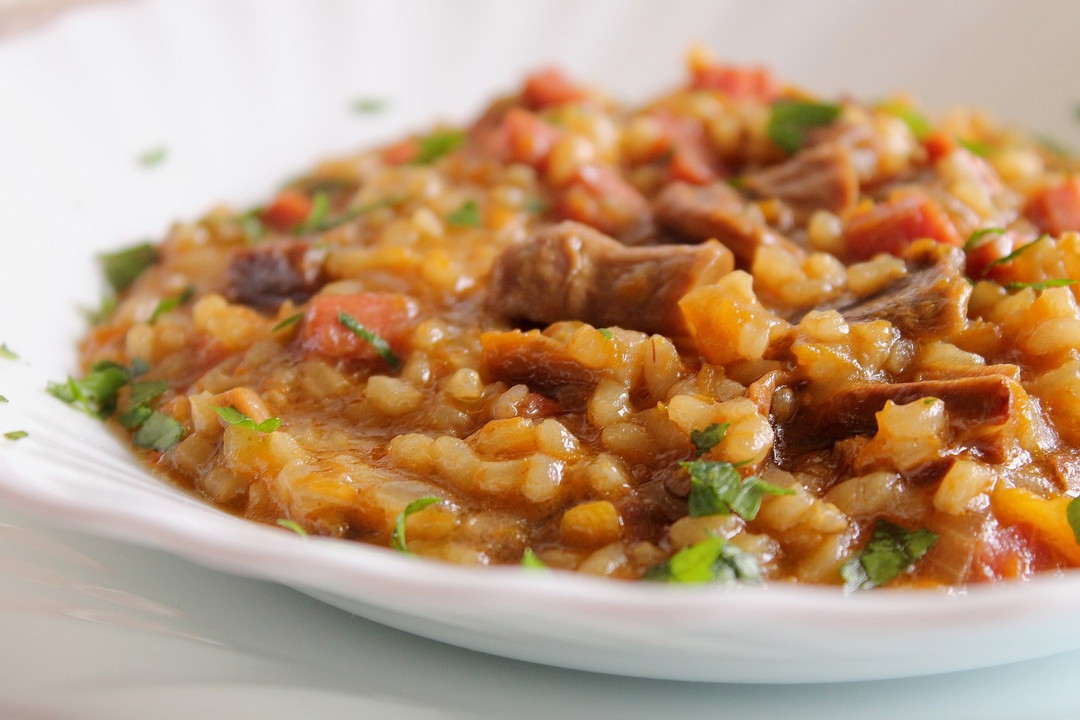 Risotto con zucca, funghi porcini e speck Fidelity Cucina