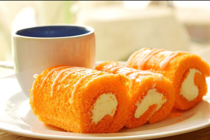 Rotolini soffici all’arancia con crema al latte