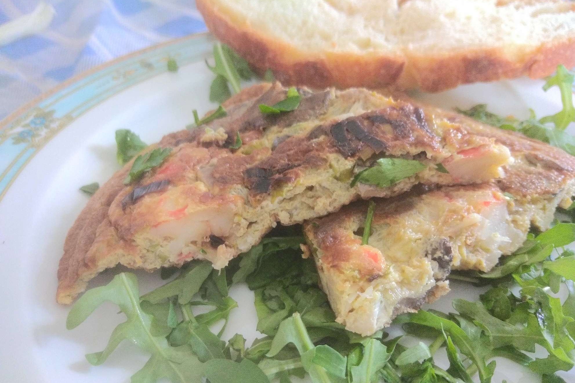 Frittata di porri con funghi e gamberi