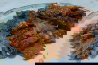 Costine con verza in umido