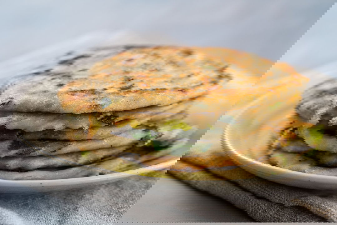 Pancakes cinesi con porri e cipollotti