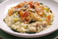 Risotto con zucchine, funghi, gorgonzola dolce e bacon croccante