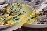 Mezzi rigatoni con spinaci, ricotta fresca e prosciutto cotto