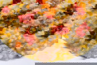 Risotto con zucca, salsiccia e pomodori secchi