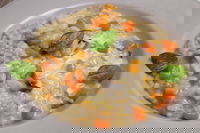Risotto con zucca, funghi e gorgonzola dolce