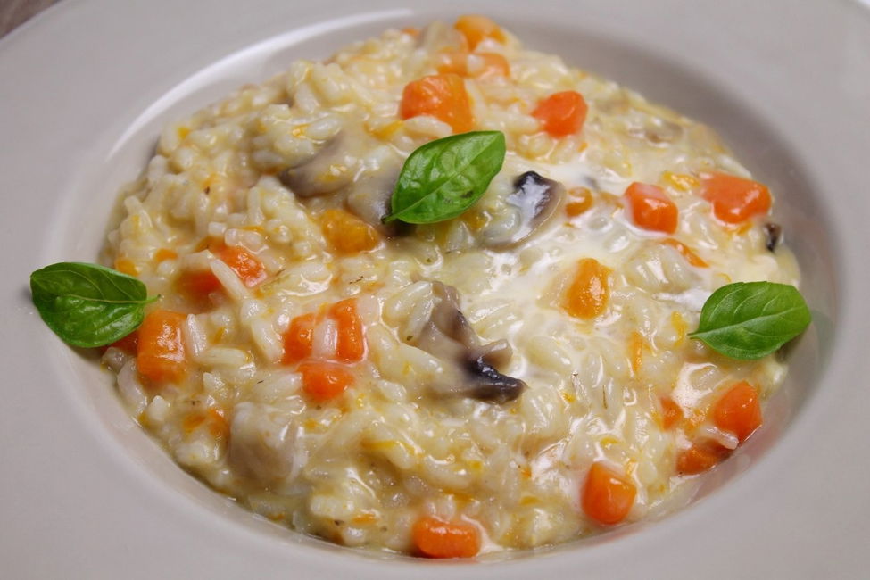 Risotto con zucca, funghi e gorgonzola dolce