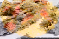 Paccheri freschi con crema di melanzane, stracchino e speck