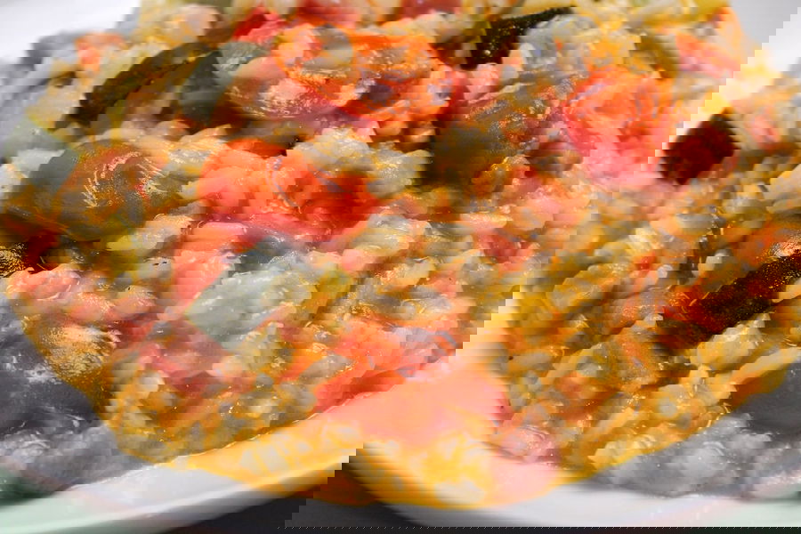 Risotto con pomodorini, zucchine e pancetta affumicata