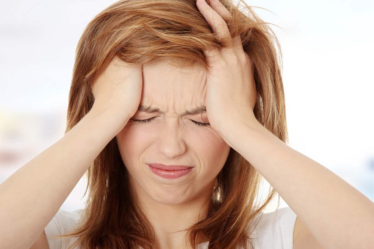 La cefalea è tra i sintomi della dismenorrea