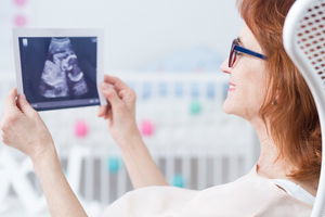 Looking at first baby’s photo