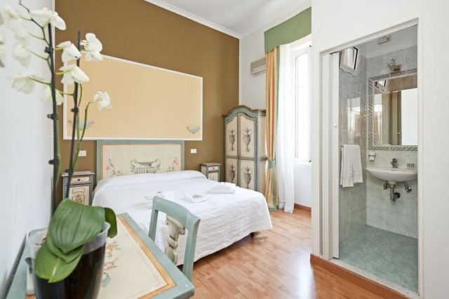 Le luminose camere dell'Hotel Infinito di Roma, albergo a 3 stelle tra i più convenienti della Capitale